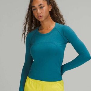 SWIFTLY TECH LONG SLEEVE SHIRT 2.0 *RACE LENGTH 
Size 8
Capri / Capture Blue